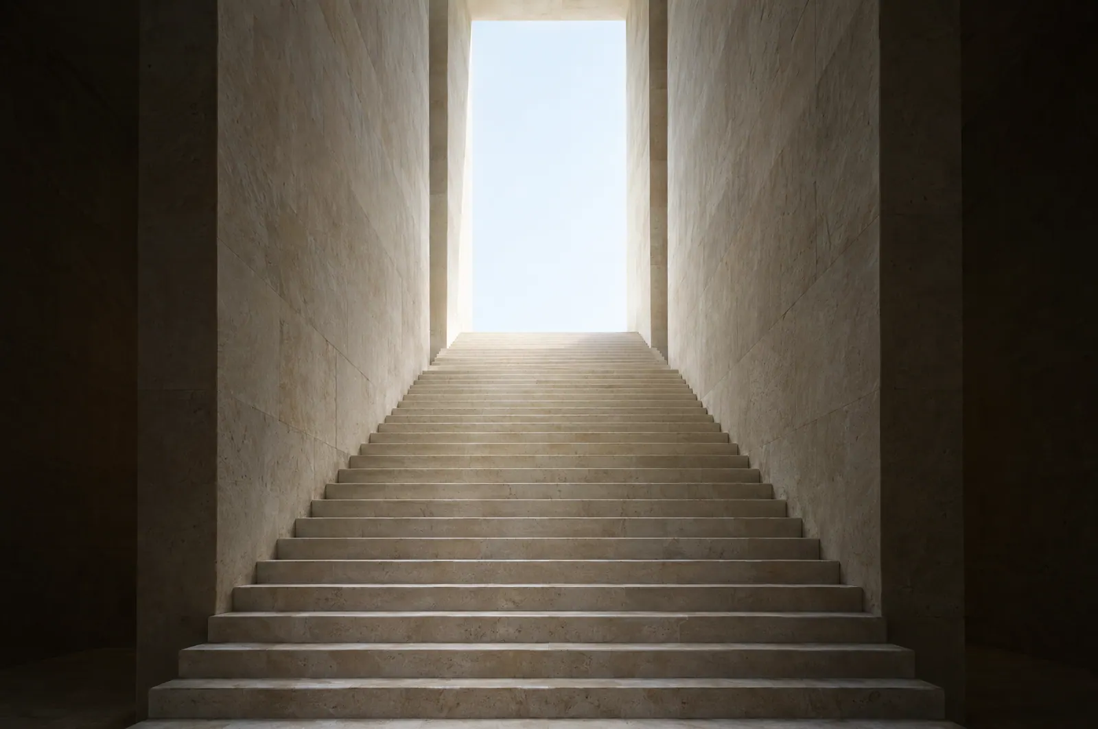 A steep limestone staircase rising toward an opening filled with daylight